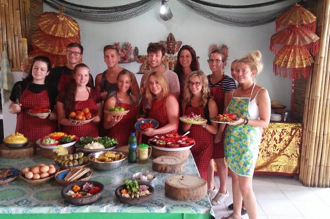 Bali Amazing Cooking Class - Inside the Balinese home kitchen: tools, welcome drinks, and hands-on cooking