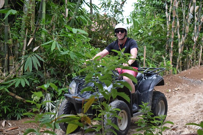 Bali ATV Ride Adventure with lunch - Safety gear and getting comfortable: helmet, boots, and the messy reality