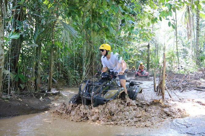 Bali ATV Ride Combo Bali Rafting best fullday tour Package - The 2-hour ATV ride in Ubud: muddy tracks, rice fields, and jungle vibes