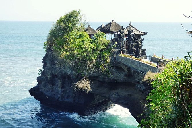 Bali Half Day Tour - Taman Ayun temple, Alas Kedaton,Tanah lot sunset Dinner - Tanah Lot at sunset: the rocky-isle temple moment plus your dinner