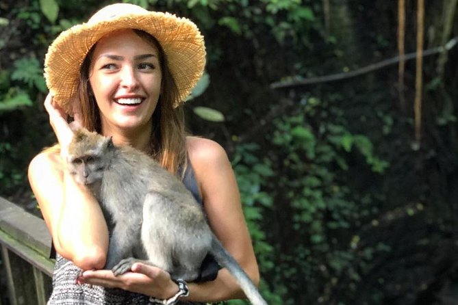 Bali Iconic Tour with Buffet Lunch and Attraction Tickets - Tegenungan Waterfall: A Jungle Walk and a View Worth the Stop