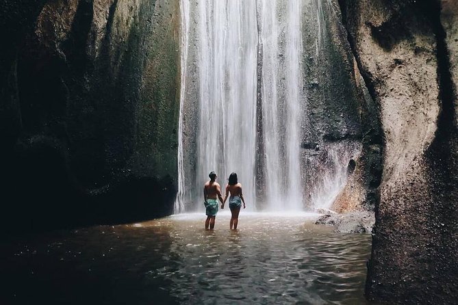 Bali Instagram Tour: Lempuyang Temple, Tirta Gangga and Tukad Cepung Waterfall - Stop 3: Tukad Cepung Waterfall in a Sun-Ray Cave