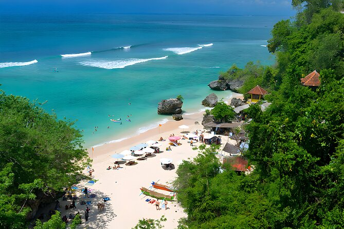 Bali Water Sports and Uluwatu Sunset Tour - Uluwatu Temple at sunset: cliffside views plus crowds