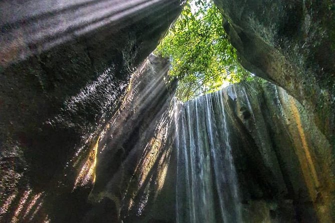 Bali Waterfalls in One Day: Tukad Cepung, 2 Hidden Waterfall, Kanto Lampo - Kanto Lampo: the famous rock cascades and the photo spot effect