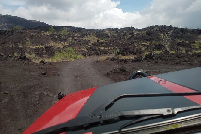 Batur Volcano Sunrise And Black Lava Jeep Adventure Tour - Short trek to black lava and sandy areas: what to expect