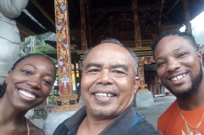 Best Of Ubud And Tanah Lot Temple Private Guide Tour - Tegenungan Waterfall: green scenery plus a guided viewpoint