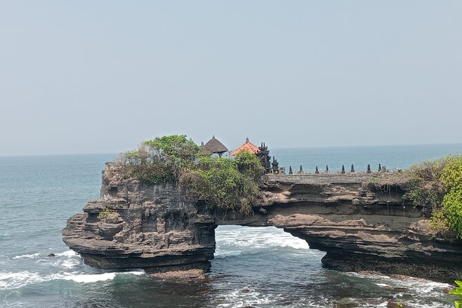 Best Of Ubud And Tanah Lot Temple Private Guide Tour - Taman Ayun Temple: fish ponds, garden calm, and strong architecture photos
