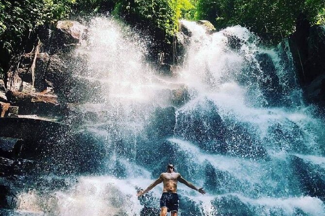 Best of Ubud Waterfalls, Tegalalang Rice Terrace and Swing Tour - Kanto Lampo Waterfall: stepped rock, quick access, big payoff