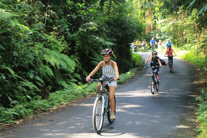 Bike ride in the rice fields, Bali countryside - Getting started: a traditional snack before you ride