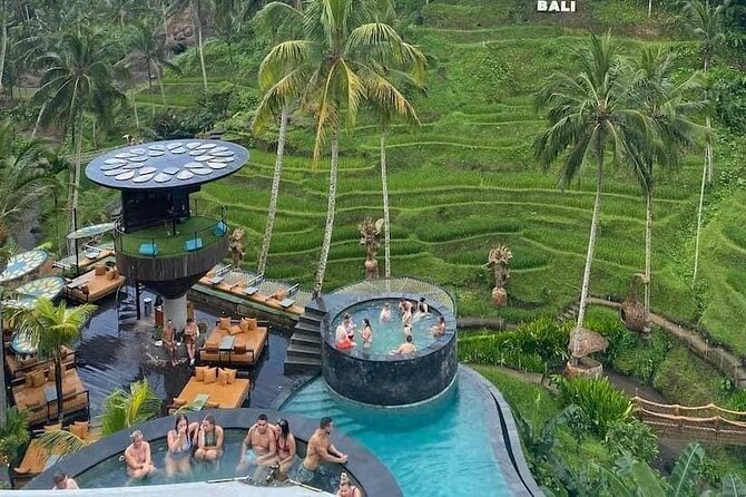 CRETYA Ubud infinity Pool + Hidden Water fall + Water Temple Tour - Mas Carving Center: a quick art stop with real local craft