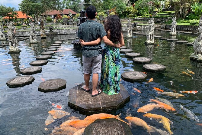 East Bali Lempuyang Temple Tirta Gangga and Waterfall Tour - Tirta Gangga Water Palace: Ponds, Gardens, and a Slower Rhythm
