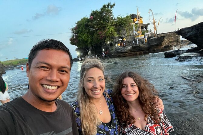 Half Day Tanah Lot Temple Private Guided Tour - Stop 2: Batu Bolong Temple rock bridge, sea-side views, and a quick hit