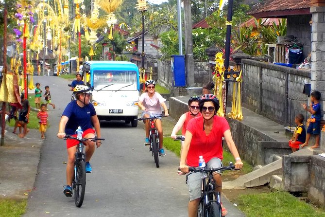 Half-Day Ubud Electric Cycling Tour to Tirta Empul Water Temple - Tirta Empul Water Temple: seeing purification in action