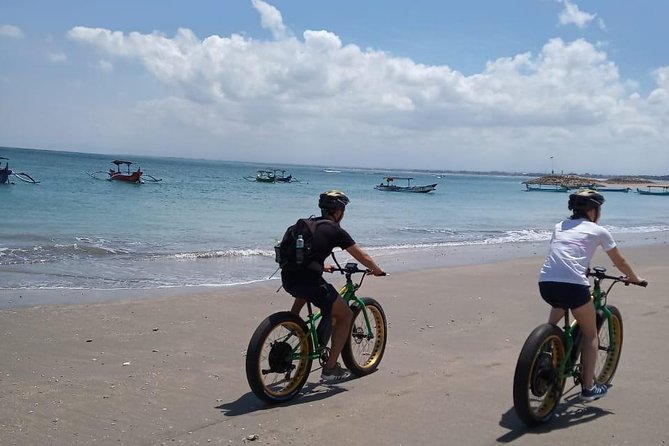 Kuta Beach eBike Private Tour - Temple and local food breaks: sea temple dress-up and a food street stop
