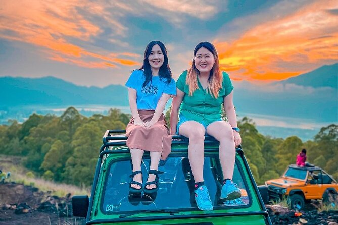 Mount Batur Jeep Sunrise and Natural Hot Spring Tour - Morning at Mount Batur: Sunrise Timing and Black Lava Fields