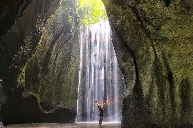 Mount Batur Sunrise Trekking and Hidden Waterfall - The Tukad Cepung Waterfall cave: sunbeams are the trick