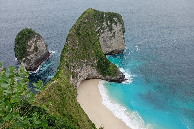Nusa Penida East And West Full Day Private Guided Tour - Stop 4: Kelingking Beach (the icon, plus myth + coconuts)