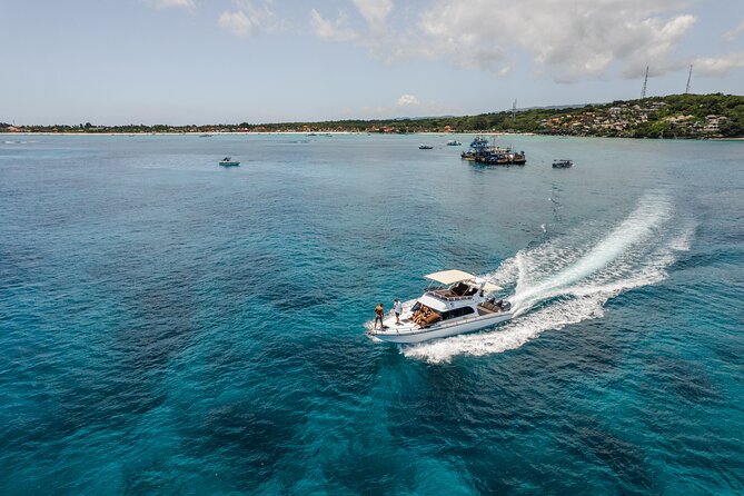 Nusa Penida Full Day Tour by Riki J Yacht 13 meters - Lembongan first: Bali Hai Lagoon vibes and calm coral gardens