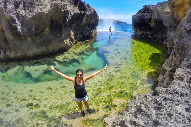 Nusa Penida Island Beach Tour - Departure From Bali Island - Pasih Uug Beach: rocky holes, dramatic rock formations, and classic cliff views
