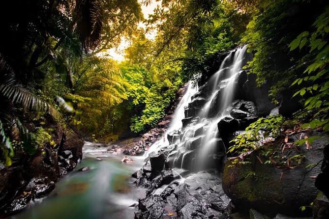Private Day Tour To Waterfalls And Ubud Sightseeing - Stop 3: Kanto Lampo Waterfall for Terraced Rocks and Easy Photo Moments