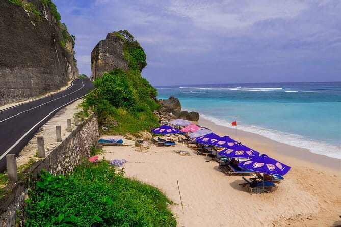Private Tour Uluwatu Temple and Kecak Sunset Dance - Pantai Melasti Ungasan: cliff views and rocky shoreline time
