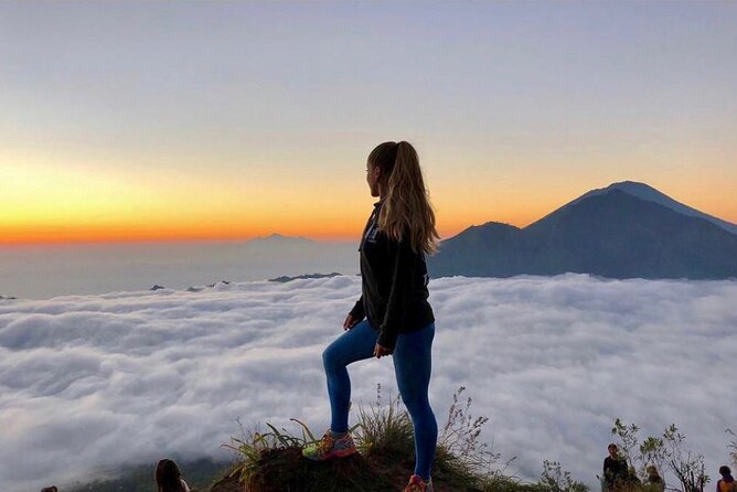 Sharing Mount Batur Sunrise Trekking And Natural Hot Spring - Batur Natural Hot Spring: towels, welcome drink, and the fried banana ritual