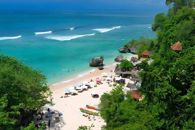 Telaga Waja White Water Rafting and Uluwatu Sunset Tour - Uluwatu Temple at sunset: a crowded classic you can plan for