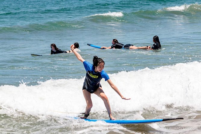 The best surf lessons in Kuta - Gear and Comfort: Board, Rash Vest, Water, and Beach Reality