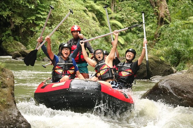 Ubud Bali ATV Quad Bike Legong Temple cave with Lunch and Pool - Ayung River rafting: class II–III rapids with rainforest scenery