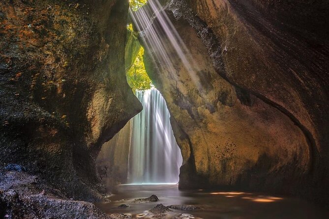Ubud Hidden Waterfalls and Rice Terrace Tours - Stop 1: Kanto Lampo Waterfall and the Stone-Walled Look