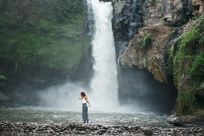 Ubud Private Chasing Waterfall and Water Temple Tour - Stop 1: Tegenungan Waterfall for that cool-off moment