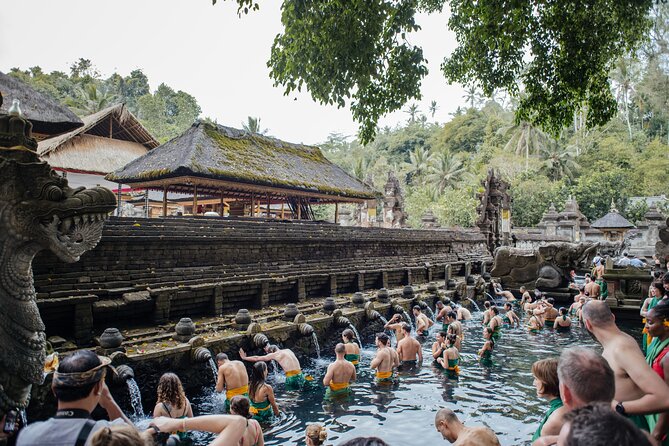 Ubud Small Group Tour: Monkey Forest, Tegalalang Rice Terraces and more - Getting There From Kuta: Pickup, Air-Conditioned Comfort, and Traffic