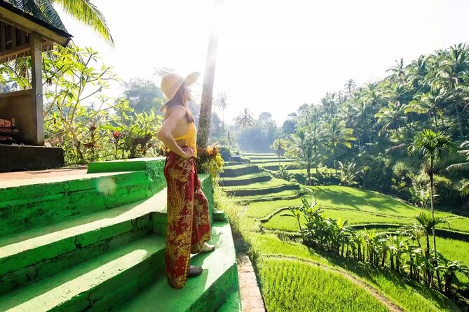 Ubud Waterfalls and Rice Terraces Private Day Tour - Kanto Lampo: cliffside cascades and a photogenic pool