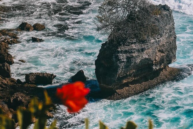 Uluwatu Temple Scenic Beaches and Fire Kecak Dance Tour - Padang Padang Beach: golden sand, turquoise water, and rock views